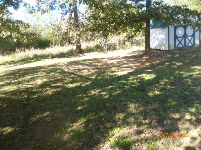 160 Haskins Chapel Road Lewisburg, TN 37091 - Photo 9 of 19 a view of a yard with plants and large trees