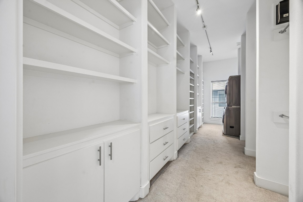 1820 Prospect Street Houston, TX 77004 - Photo 14 of 17 a hallway with white cabinets
