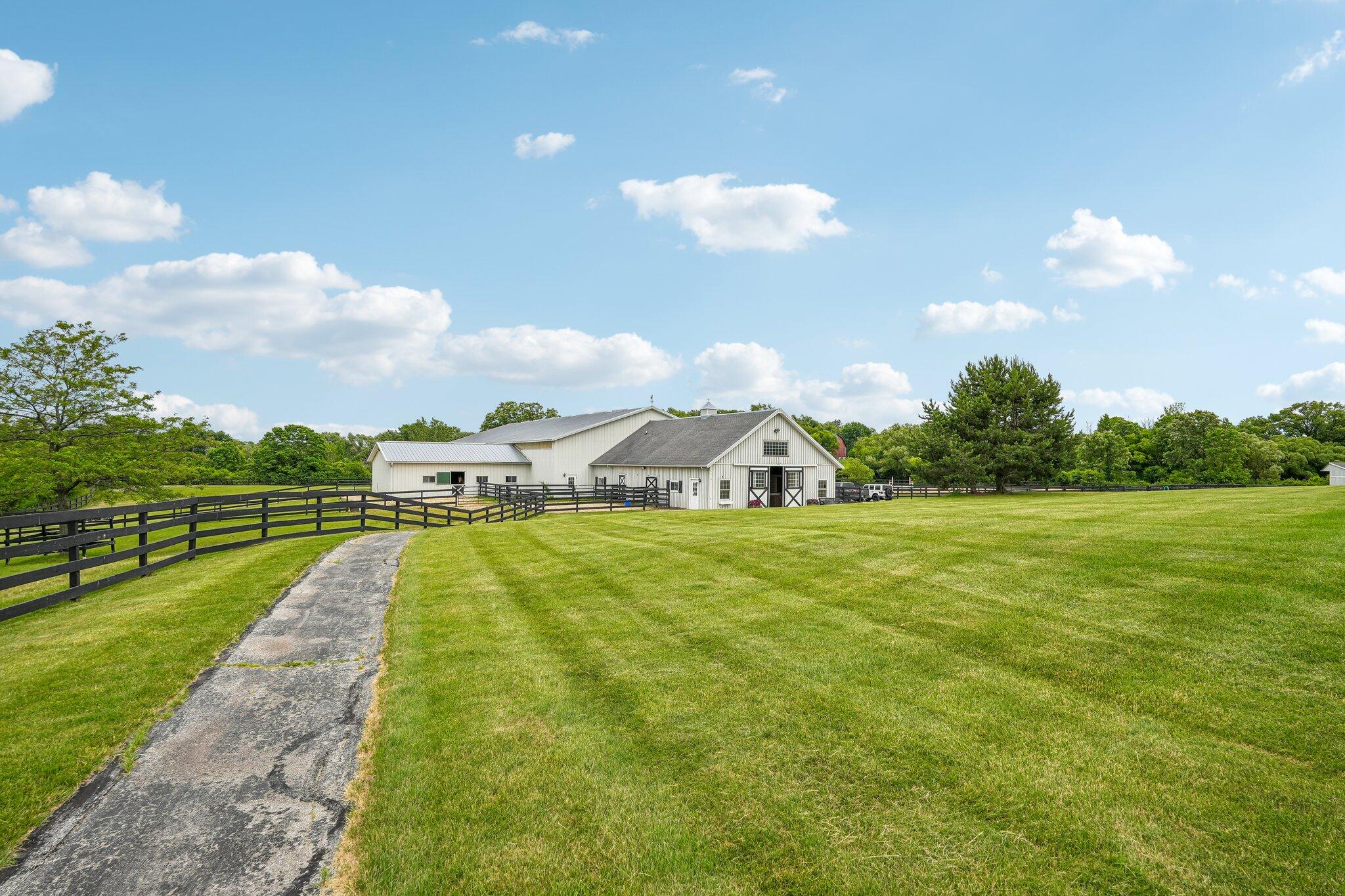 13700 Riverland Road Mequon, WI 53097 - Photo 55 of 69 Path to barn and arena