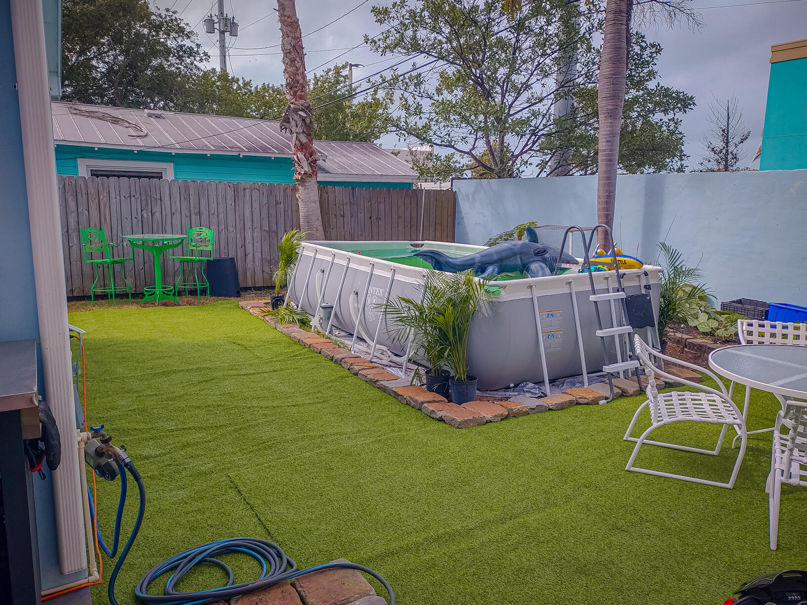 2311 Patterson Avenue Key West, FL 33040 - Photo 16 of 39 a view of a backyard with couches plants and wooden fence