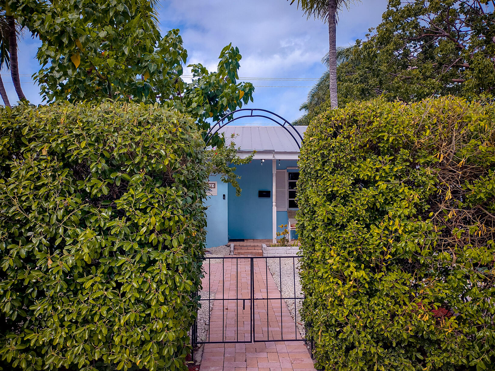 2311 Patterson Avenue Key West, FL 33040 - Photo 19 of 39 front view of a house with a tree