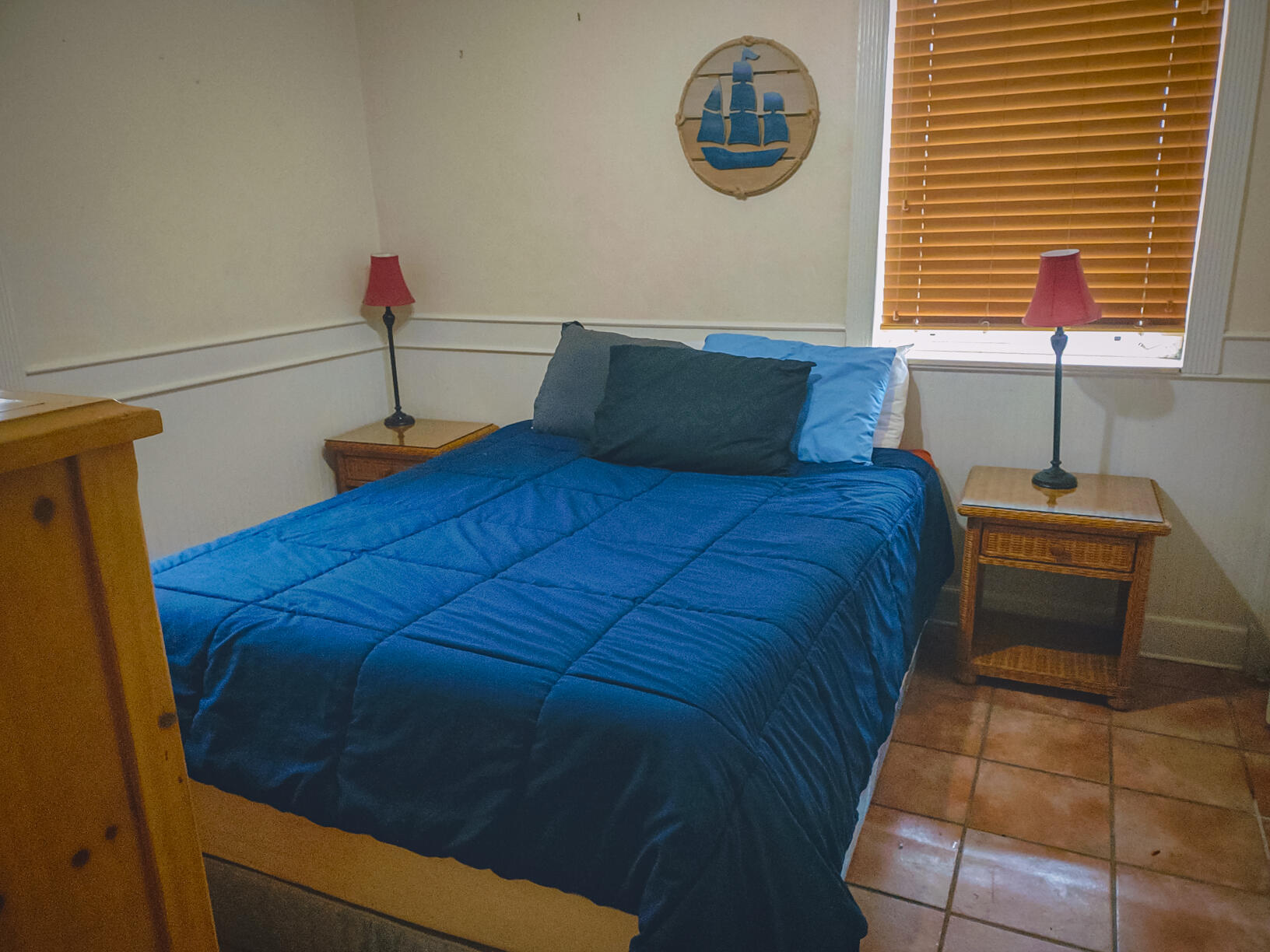 2311 Patterson Avenue Key West, FL 33040 - Photo 21 of 39 a bed sitting in a bedroom next to a window