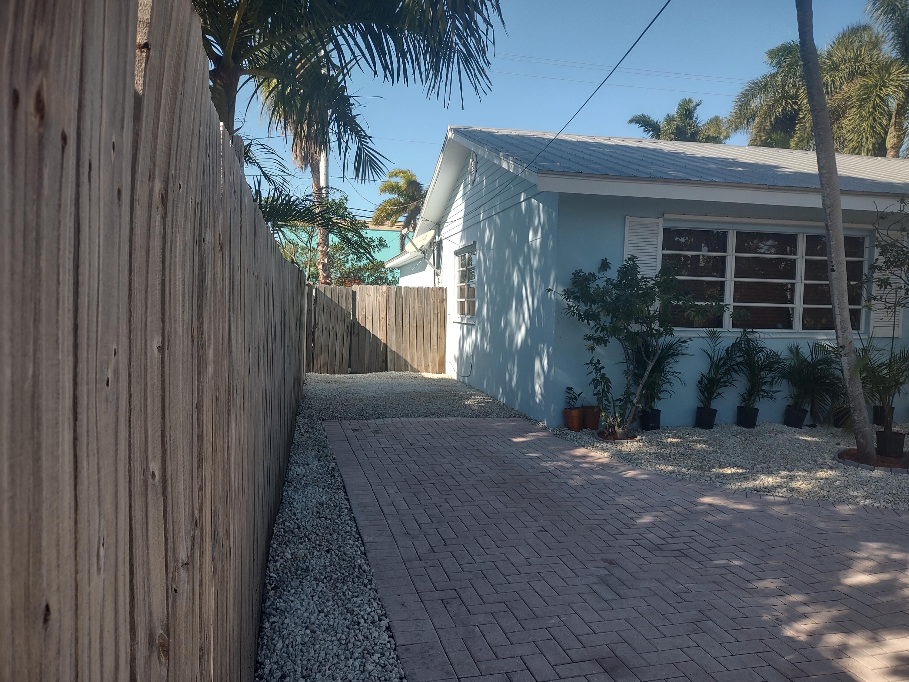 2311 Patterson Avenue Key West, FL 33040 - Photo 30 of 39 a front view of a house having yard