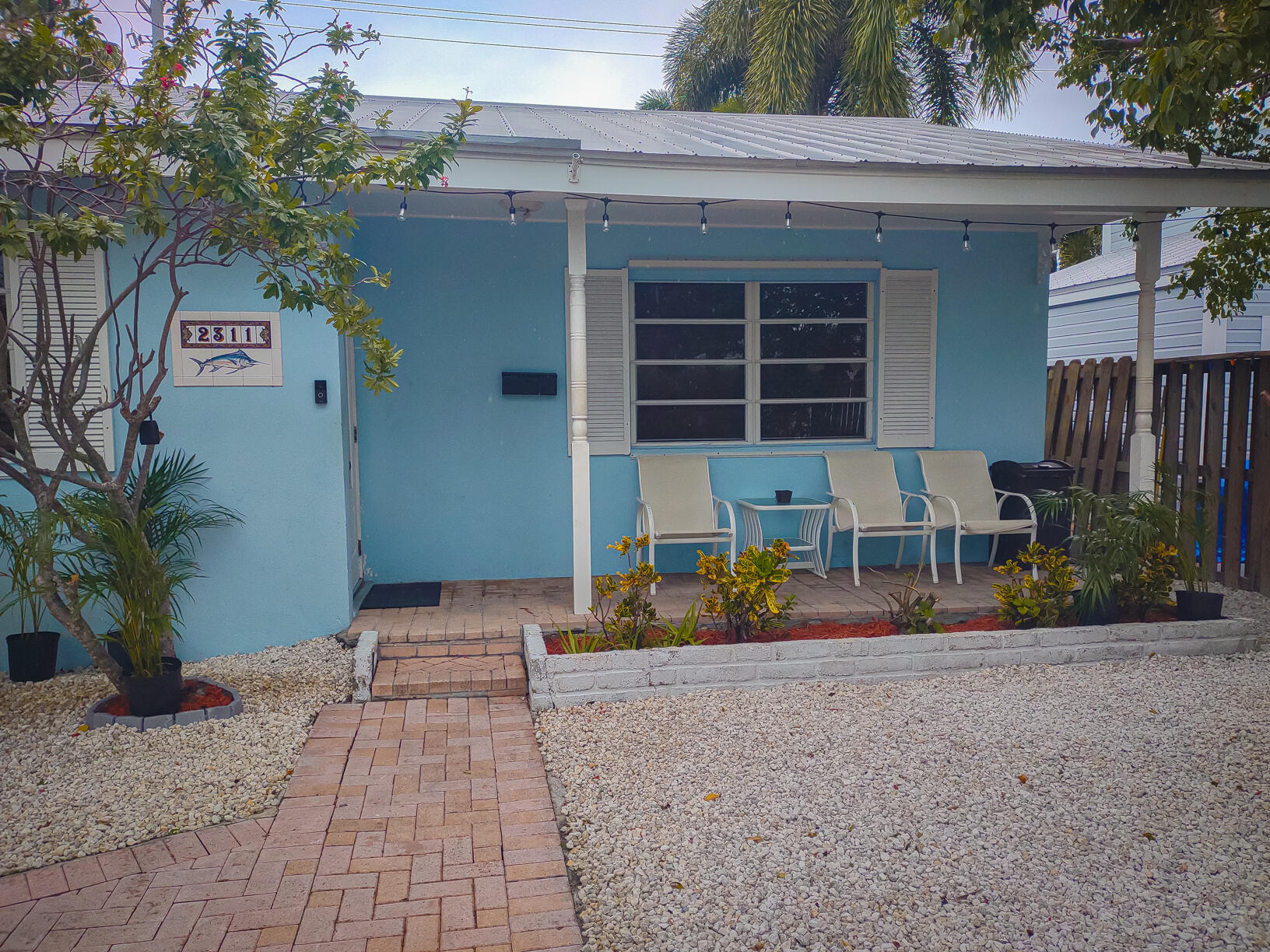 2311 Patterson Avenue Key West, FL 33040 - Photo 3 of 39 a front view of a house with porch