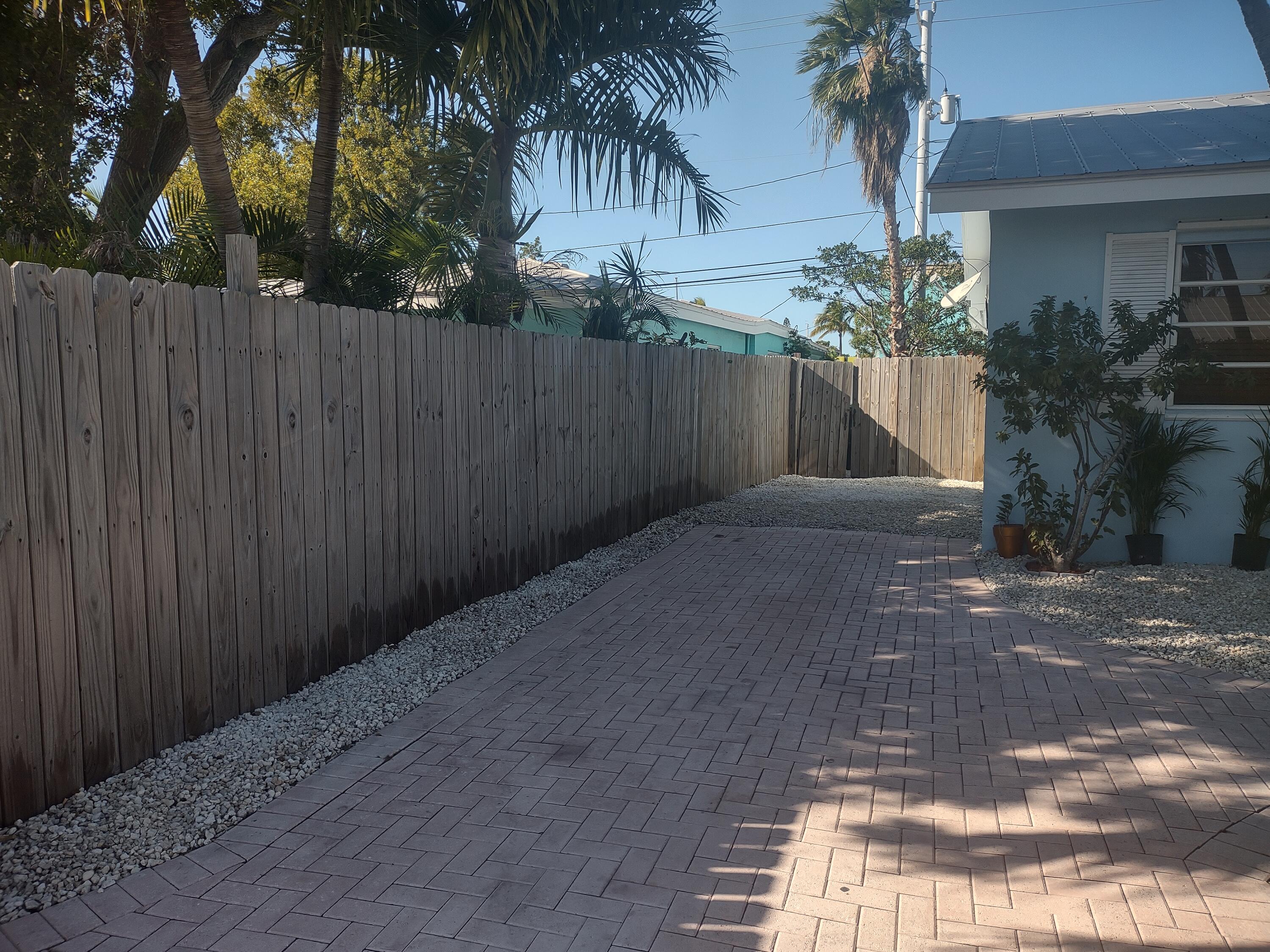 2311 Patterson Avenue Key West, FL 33040 - Photo 31 of 39 a view of backyard with palm trees