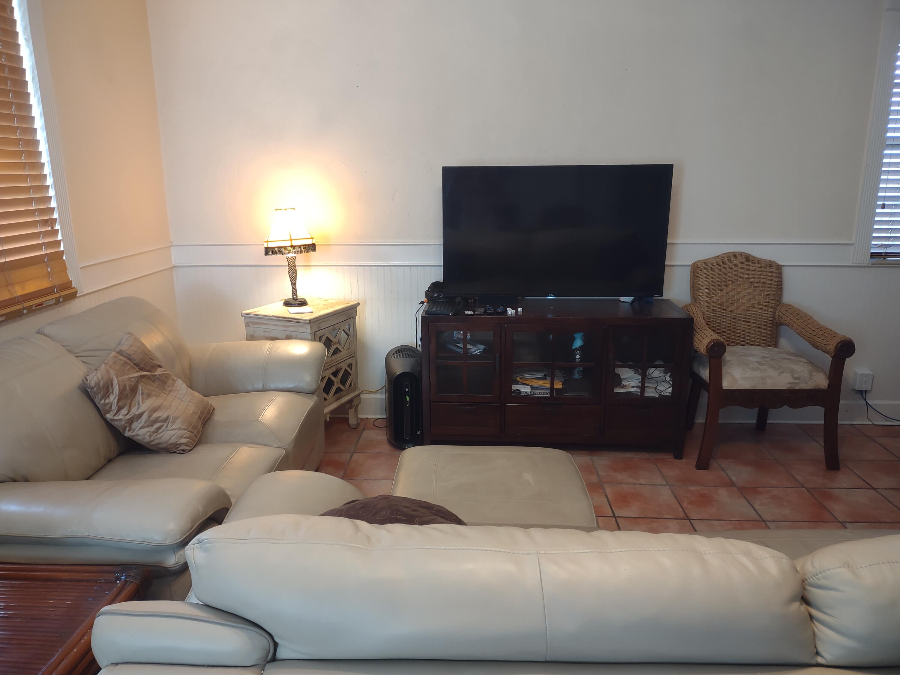 2311 Patterson Avenue Key West, FL 33040 - Photo 33 of 39 a living room with furniture and a flat screen tv