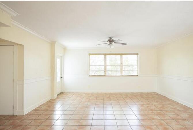 2311 Patterson Avenue Key West, FL 33040 - Photo 36 of 39 an empty room with windows and chandelier fan