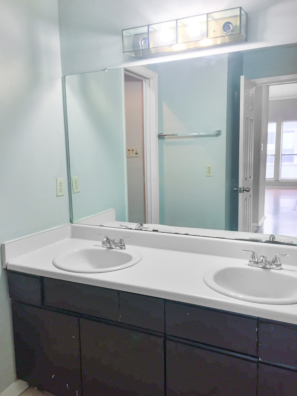 807 West 25th Street, Unit 312 Austin, TX 78705 - Photo 10 of 15 Bathroom featuring double vanity