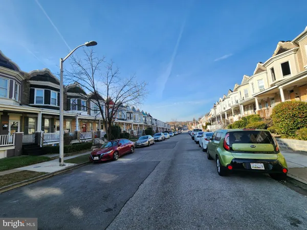 a view of a street with cars