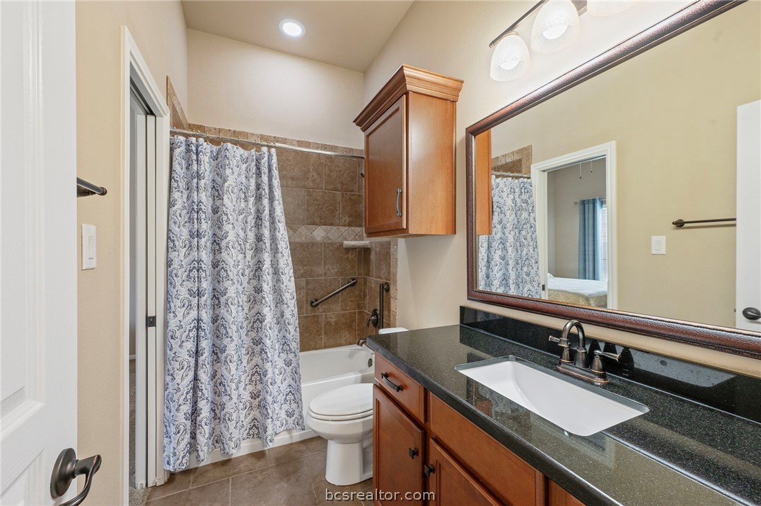 3085 Archer Circle Bryan, TX 77808 - Photo 21 of 32 Guest bath with easy access from all secondary bedrooms.