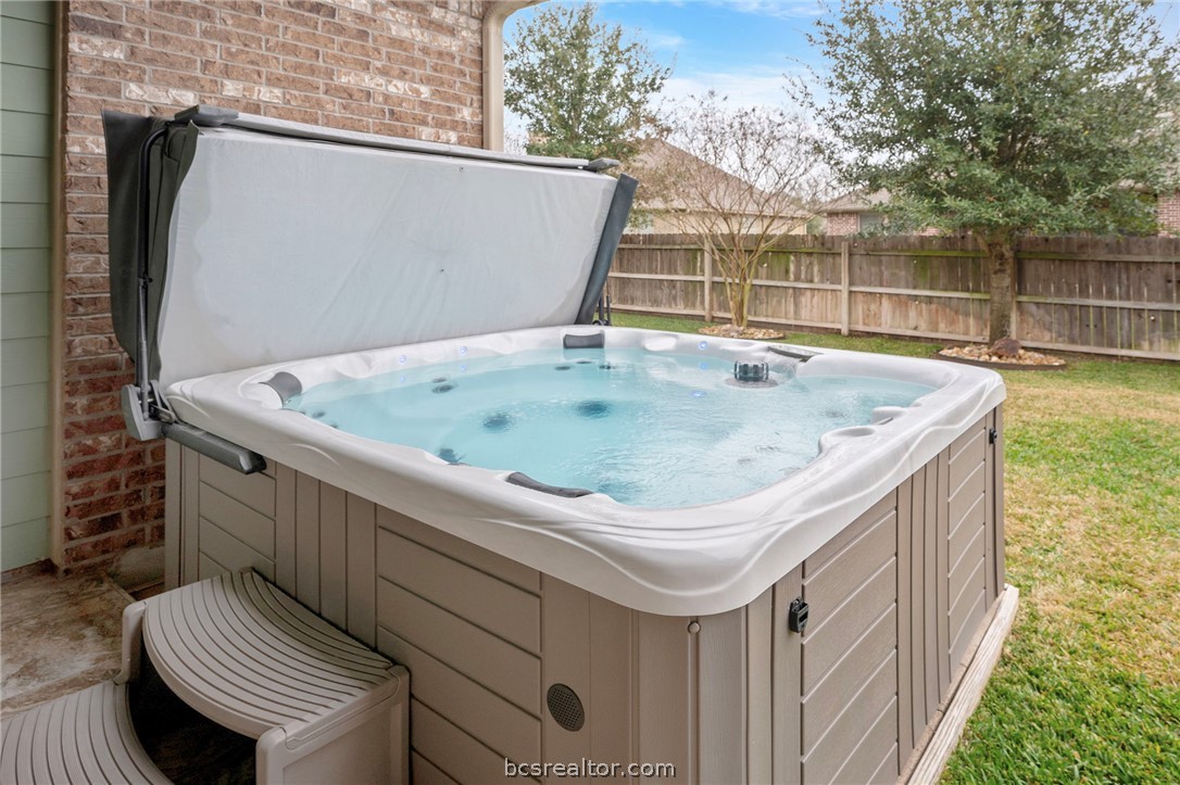 3085 Archer Circle Bryan, TX 77808 - Photo 27 of 32 Premium hot tub with folding cover, lights and spacious seating.