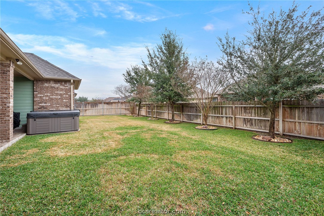 3085 Archer Circle Bryan, TX 77808 - Photo 31 of 32 Back yard has numerous trees providing shade, privacy and beauty.
