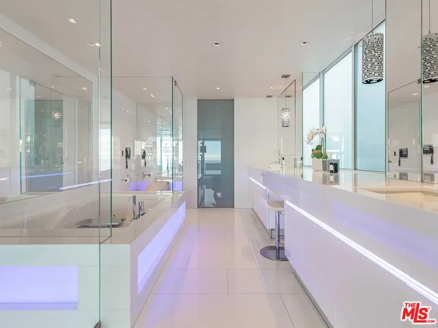 a bedroom with a bed dresser and a window