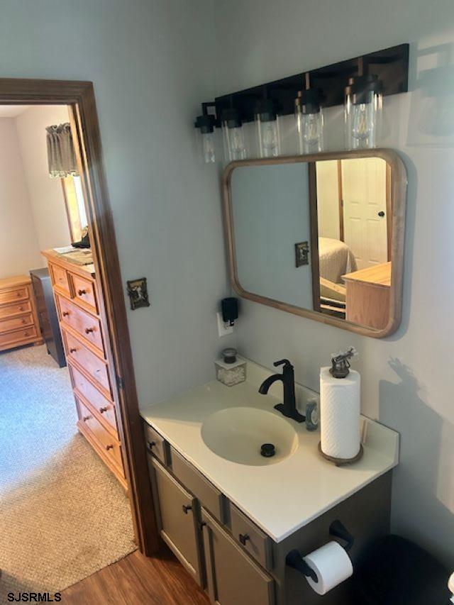 120 Head Of River Road Corbin City, NJ 08270 - Photo 16 of 19 a bathroom with a sink and a mirror