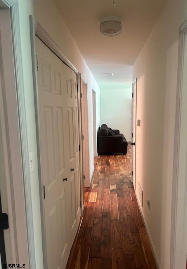 120 Head Of River Road Corbin City, NJ 08270 - Photo 7 of 19 a view of a hallway with wooden floor and closet