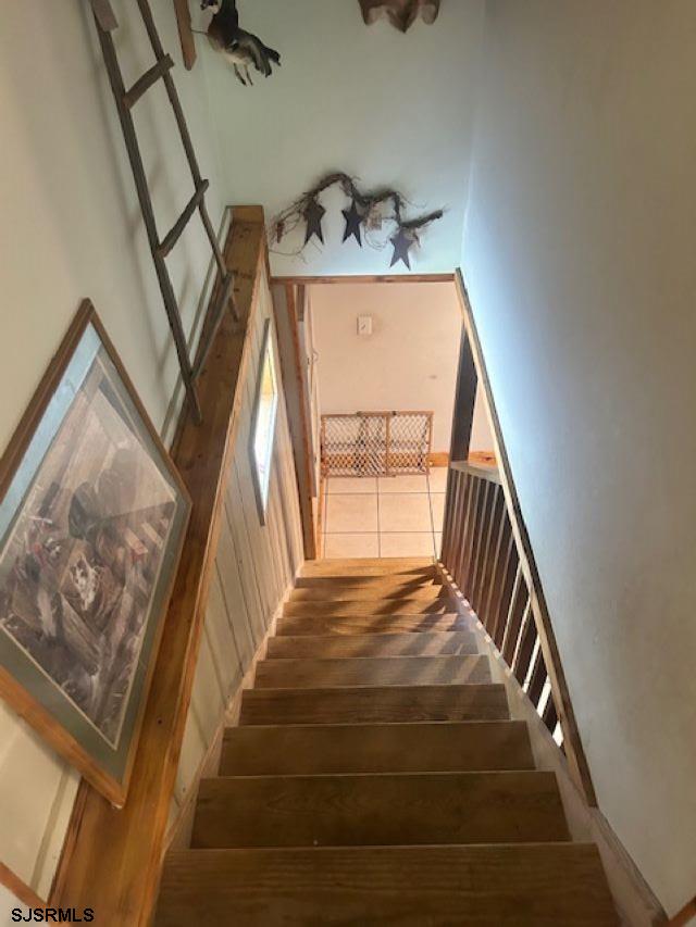 120 Head Of River Road Corbin City, NJ 08270 - Photo 8 of 19 a view of staircase with large window