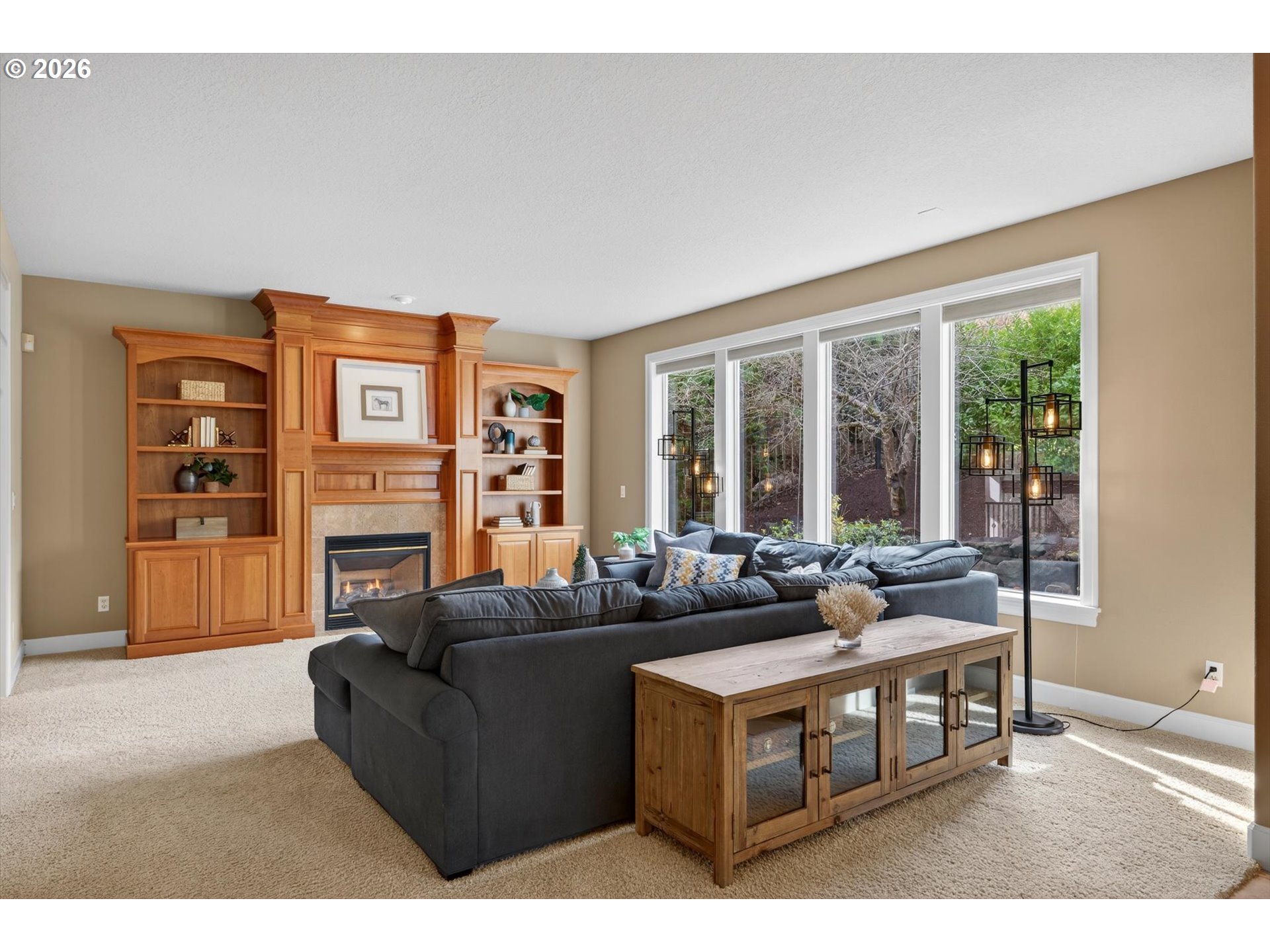3390 Quail Ridge Court West Linn, OR 97068 - Photo 11 of 48 a living room with furniture and a large window