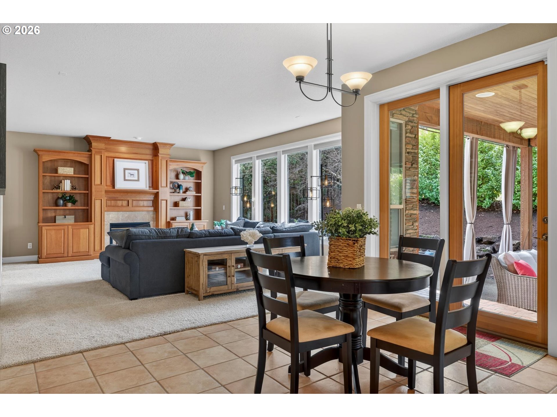 3390 Quail Ridge Court West Linn, OR 97068 - Photo 13 of 48 a dining room with furniture and large windows