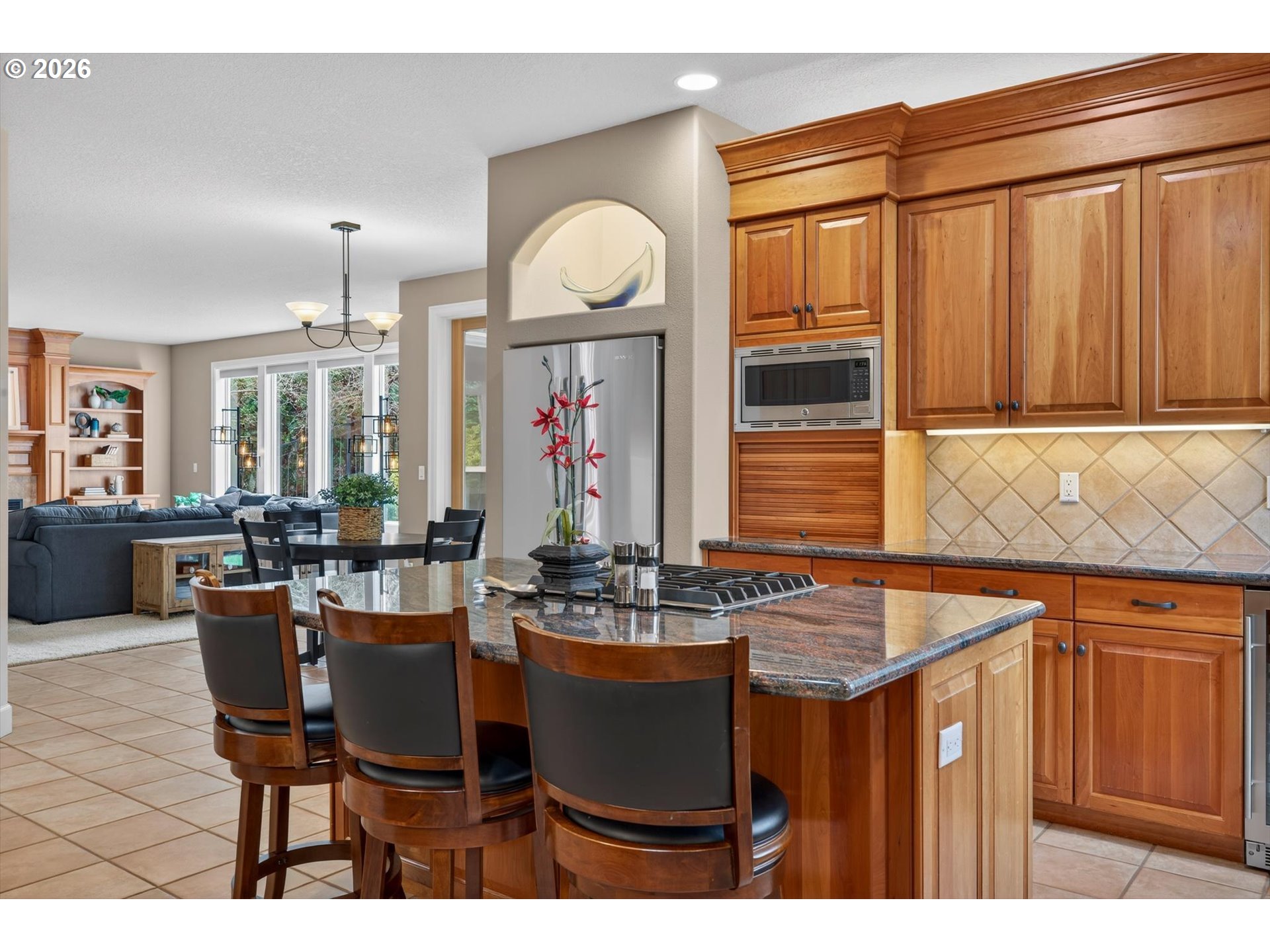 3390 Quail Ridge Court West Linn, OR 97068 - Photo 17 of 48 a view of a dining room with furniture and window