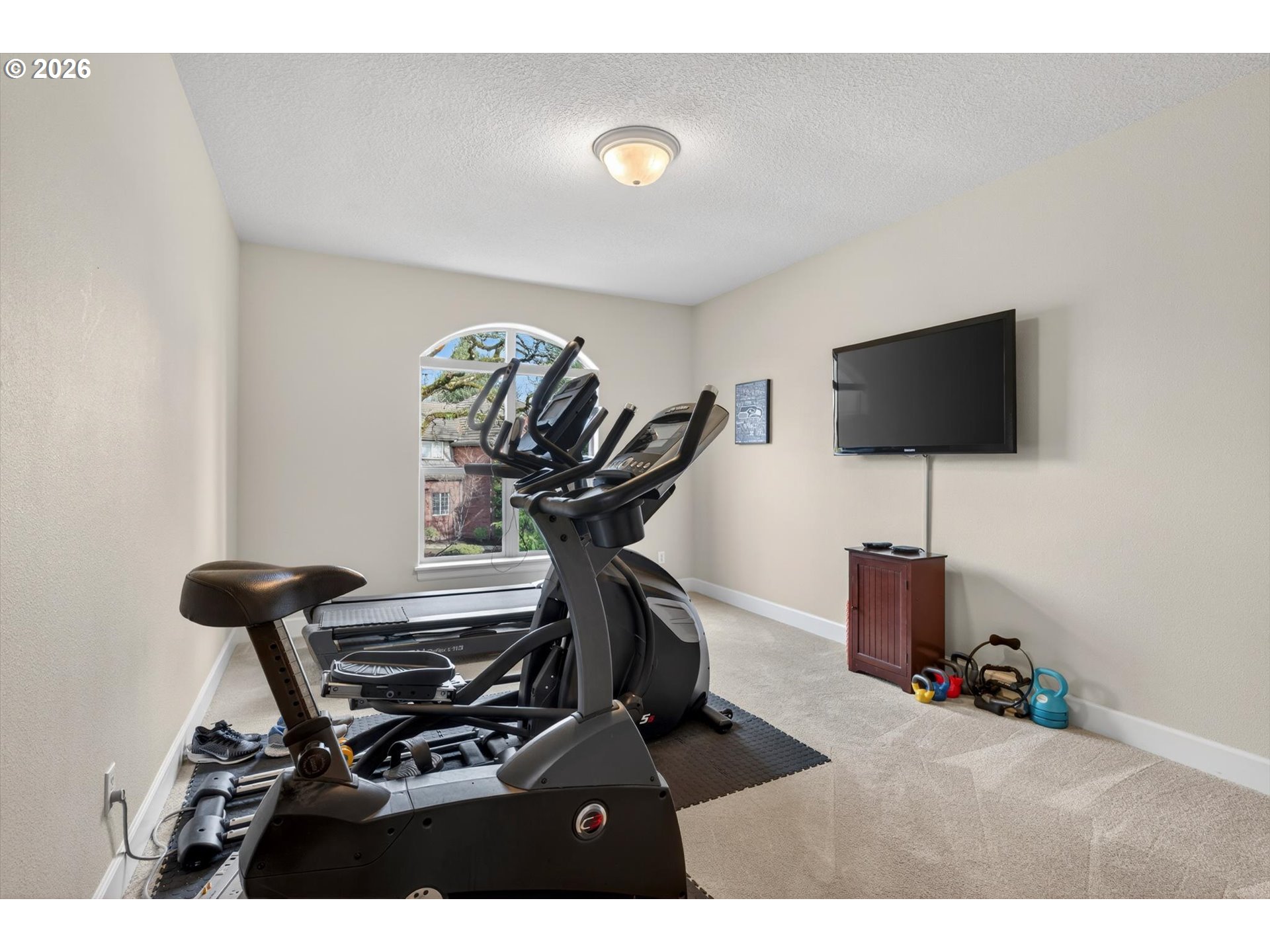 3390 Quail Ridge Court West Linn, OR 97068 - Photo 21 of 48 a view of a workspace with furniture and a window