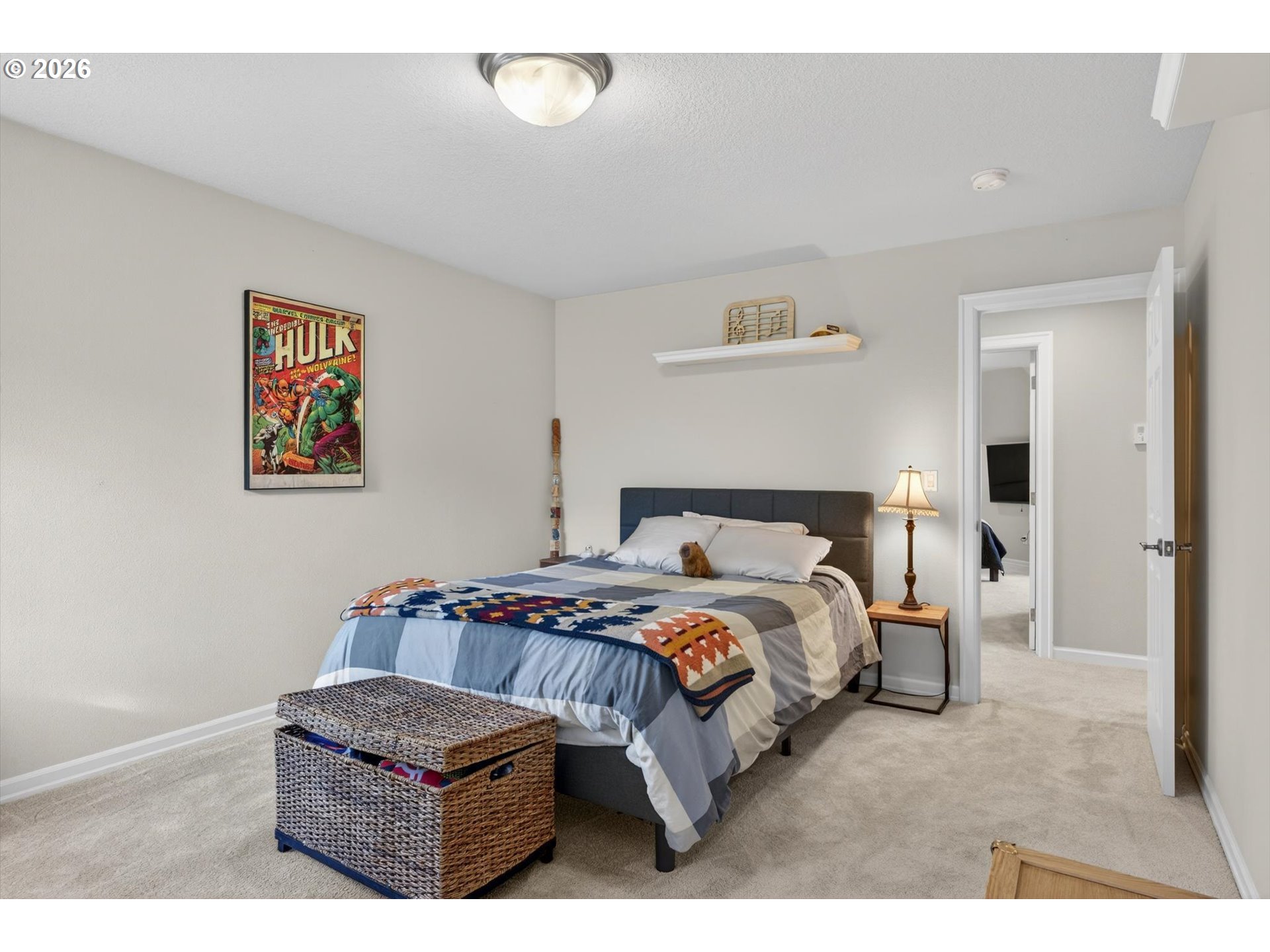 3390 Quail Ridge Court West Linn, OR 97068 - Photo 33 of 48 a bedroom with a bed and a painting on the wall