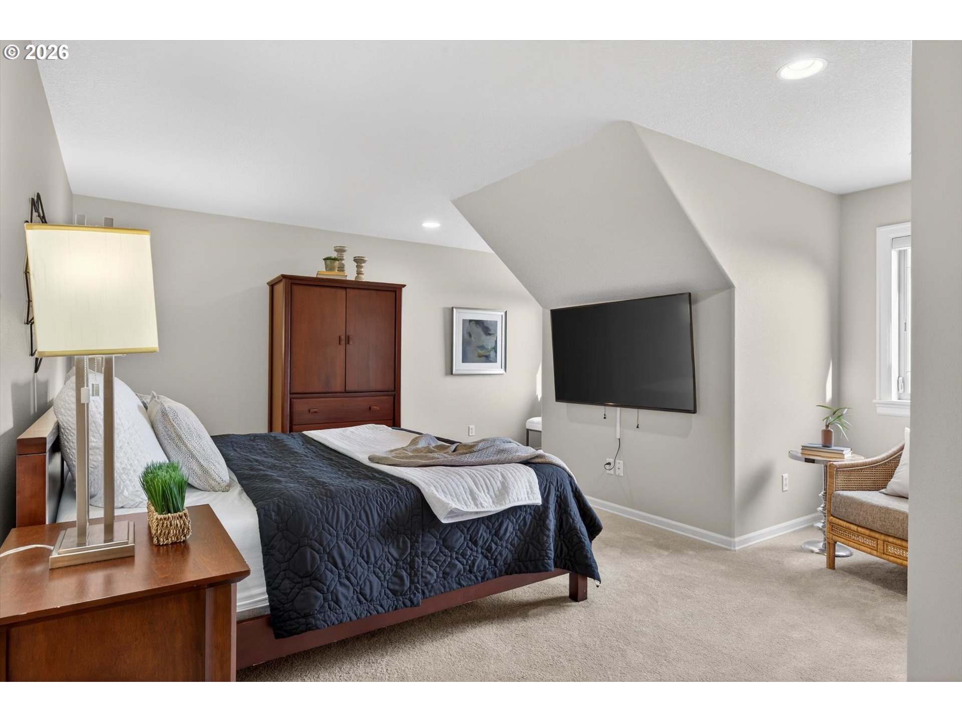 3390 Quail Ridge Court West Linn, OR 97068 - Photo 34 of 48 a bedroom with a bed and a flat screen tv