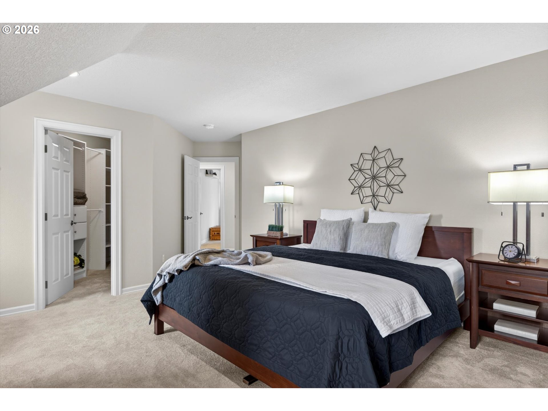 3390 Quail Ridge Court West Linn, OR 97068 - Photo 35 of 48 a bedroom with a bed and a lamp