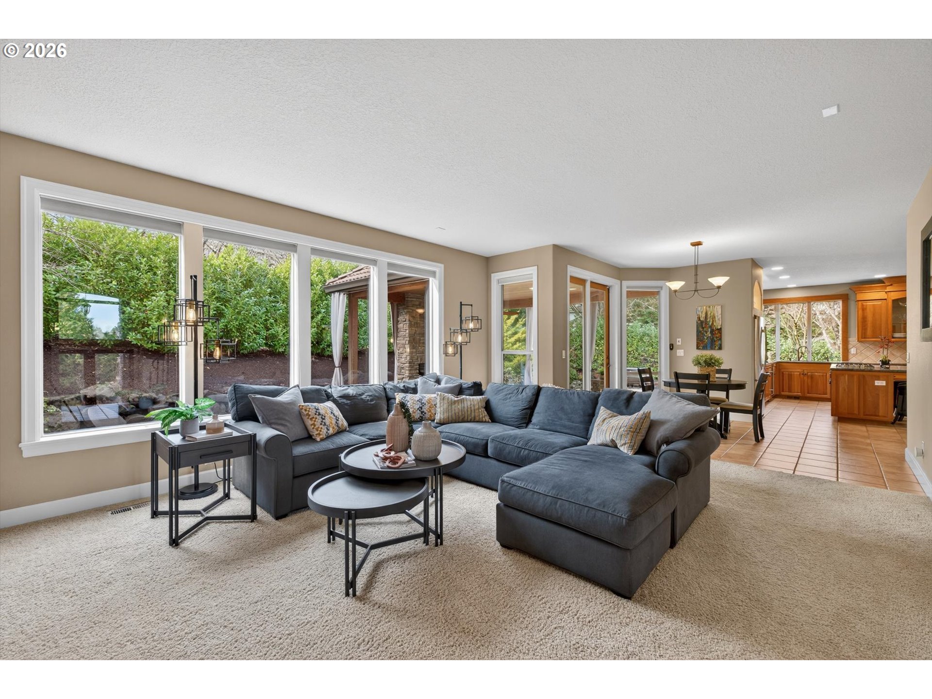 3390 Quail Ridge Court West Linn, OR 97068 - Photo 9 of 48 a living room with furniture and a large window