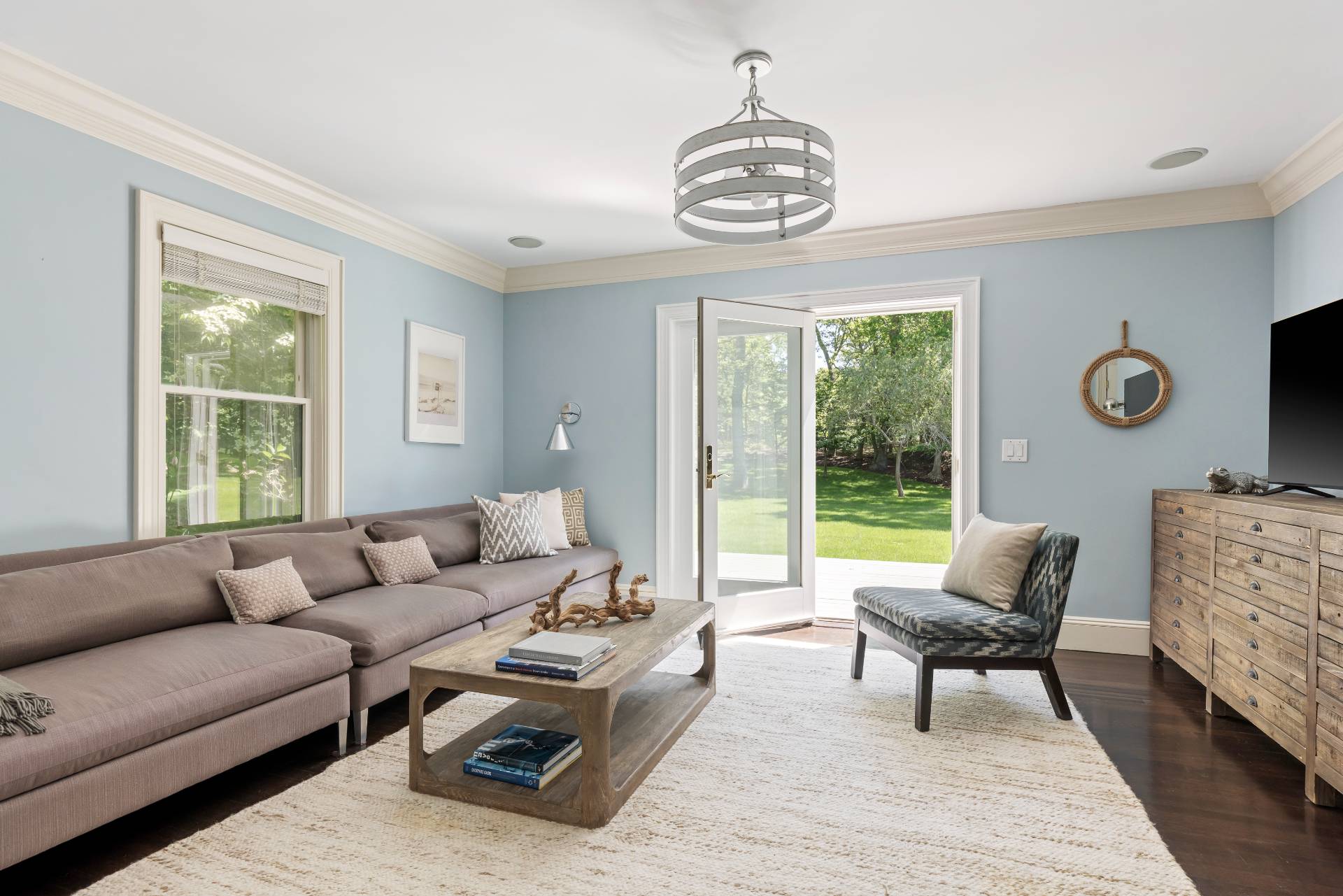 344 Accabonac Road East Hampton, NY 11937 - Photo 14 of 28 a living room with furniture and a chandelier
