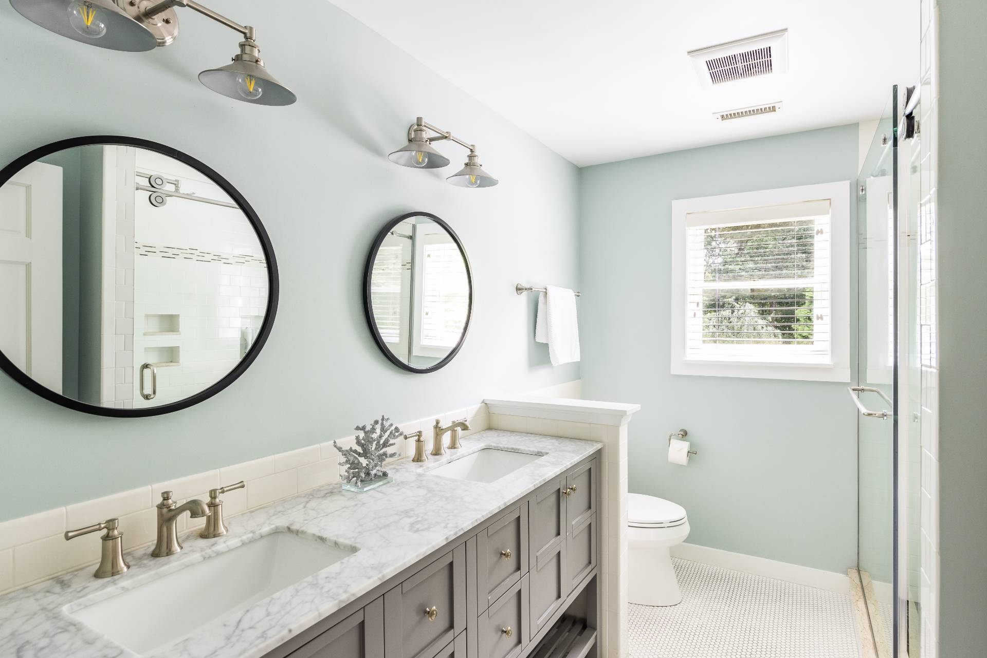 344 Accabonac Road East Hampton, NY 11937 - Photo 22 of 28 a bathroom with a granite countertop toilet a sink and a mirror