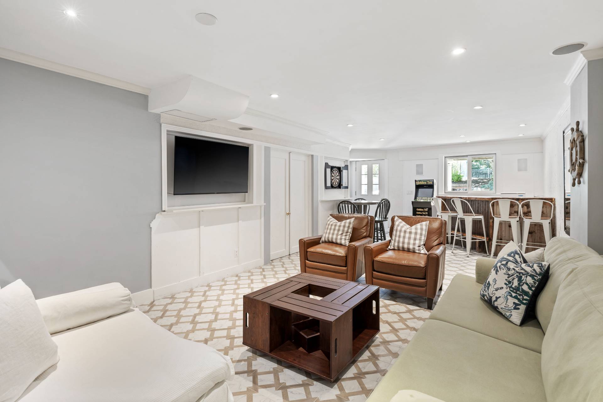 344 Accabonac Road East Hampton, NY 11937 - Photo 23 of 28 a living room with furniture and a flat screen tv