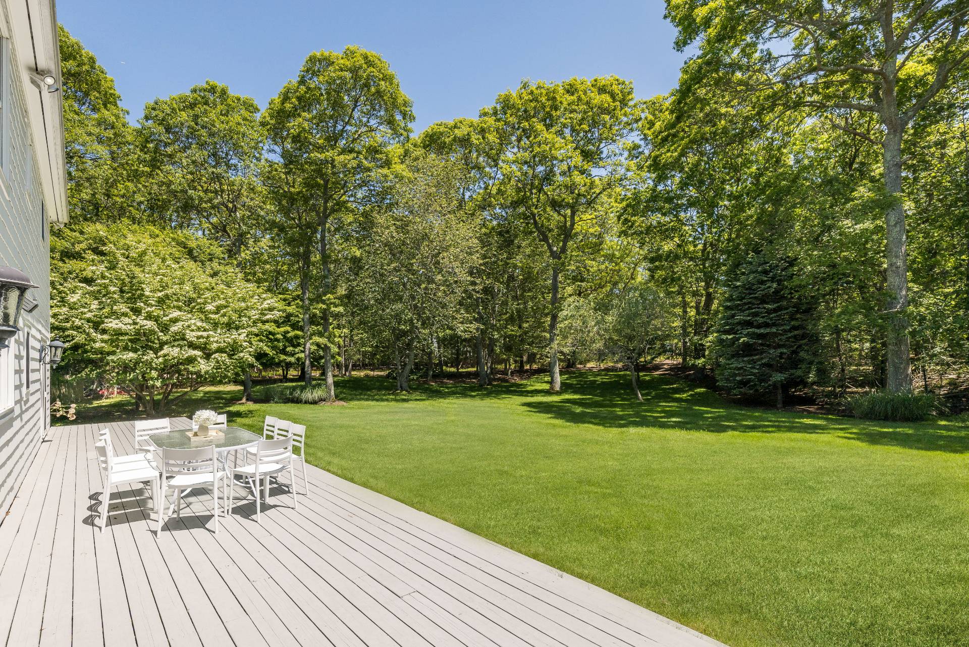 344 Accabonac Road East Hampton, NY 11937 - Photo 26 of 28 a view of a chair and table on the wooden floor