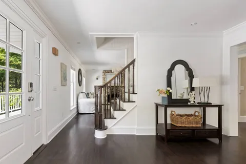 a bedroom with a bed and a fireplace