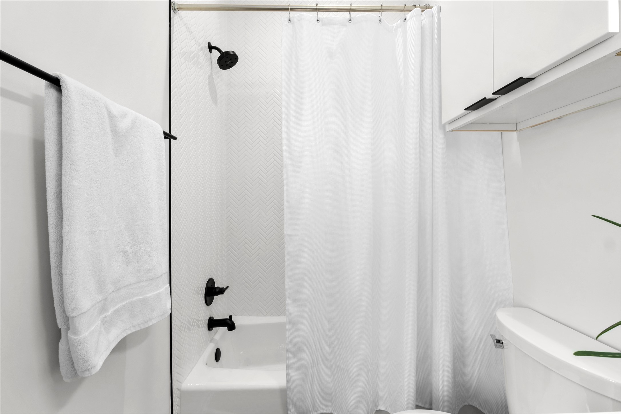 410 West Alpine Road, Unit 10 Austin, TX 78704 - Photo 24 of 31 a bathroom with a bathtub and a shower