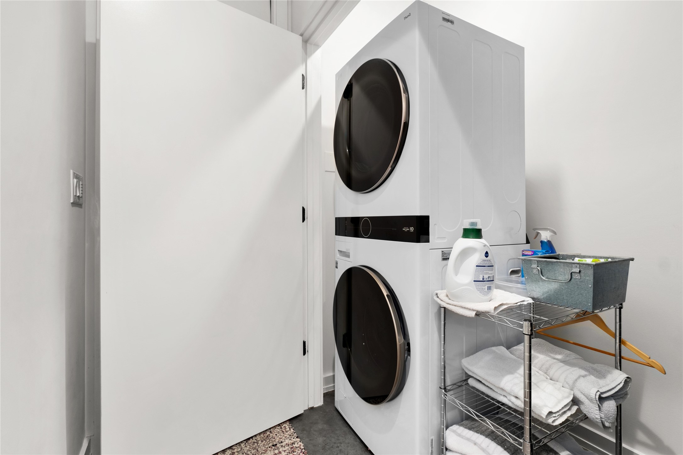 410 West Alpine Road, Unit 10 Austin, TX 78704 - Photo 25 of 31 a close view of a utility room with dryer and washer