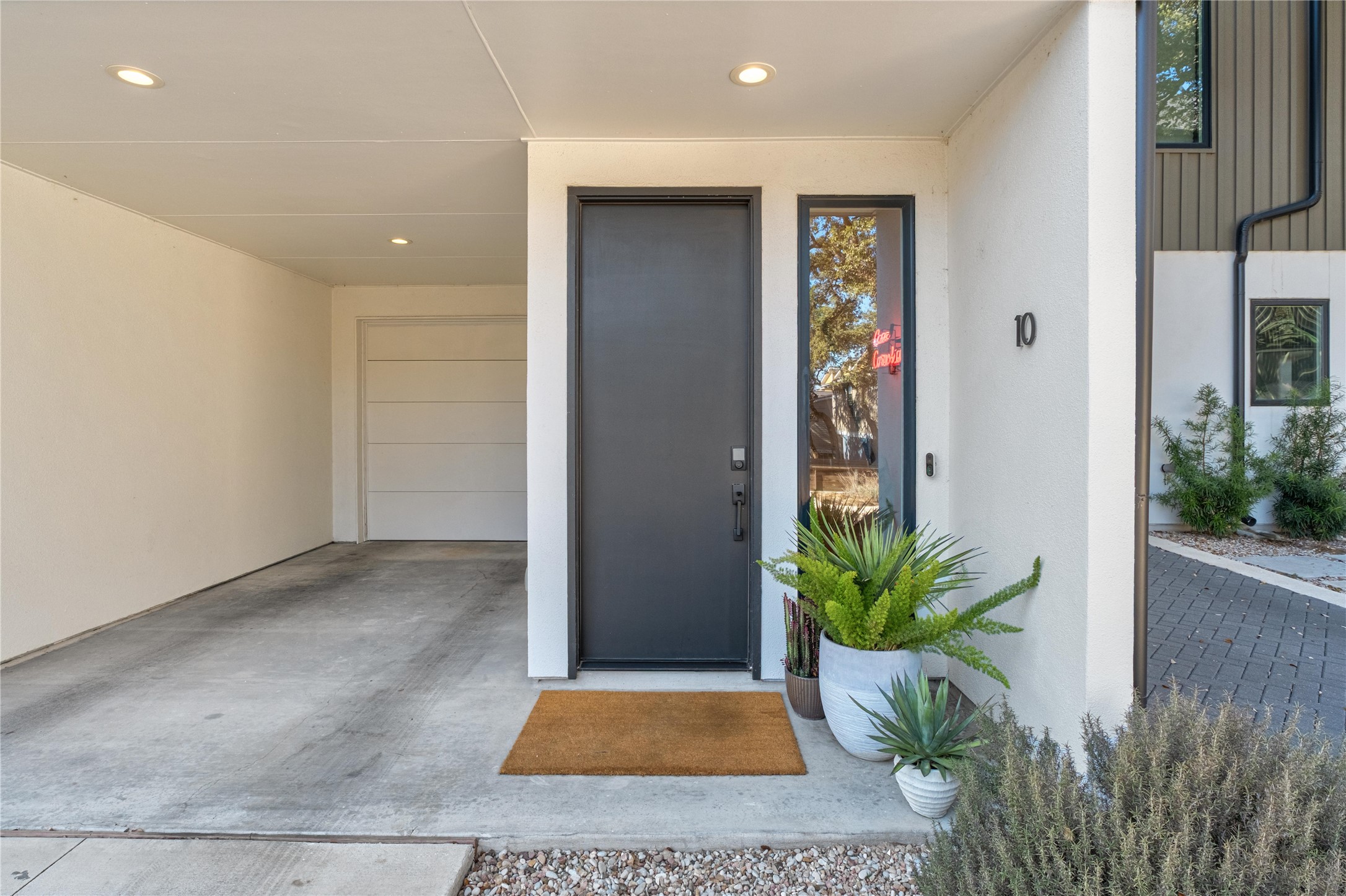 410 West Alpine Road, Unit 10 Austin, TX 78704 - Photo 3 of 31 a view of entryway with a potted plant