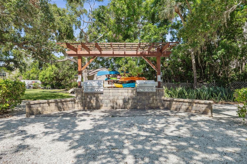 6415 Midnight Pass Road, Unit 211 Sarasota, FL 34242 - Photo 50 of 58 a view of outdoor space with seating area