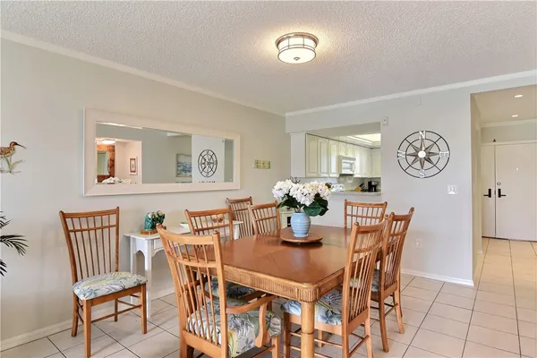a kitchen with stainless steel appliances granite countertop white cabinets sink and dishwasher