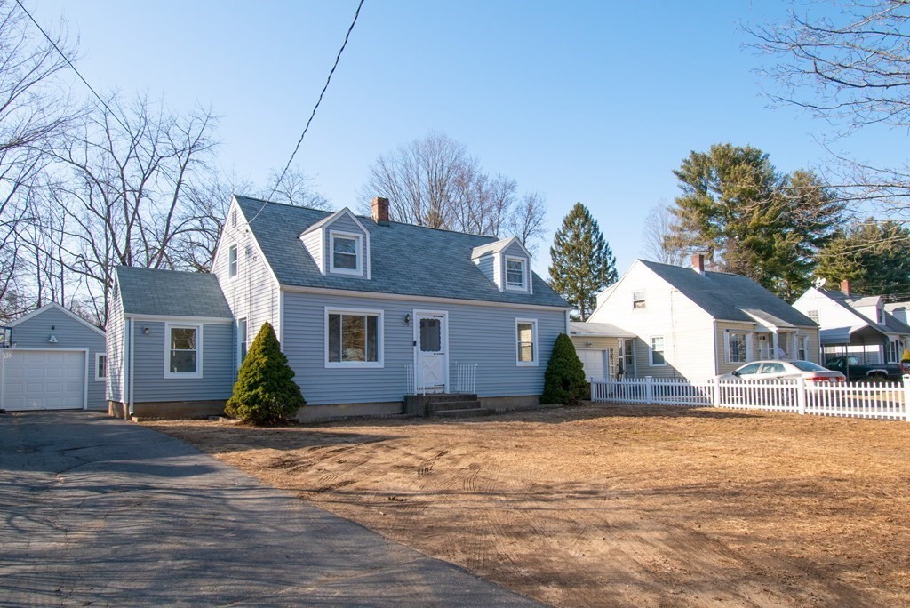 24 Lumae Street Springfield, MA 01119 - Photo 1 of 33 a front view of house with yard