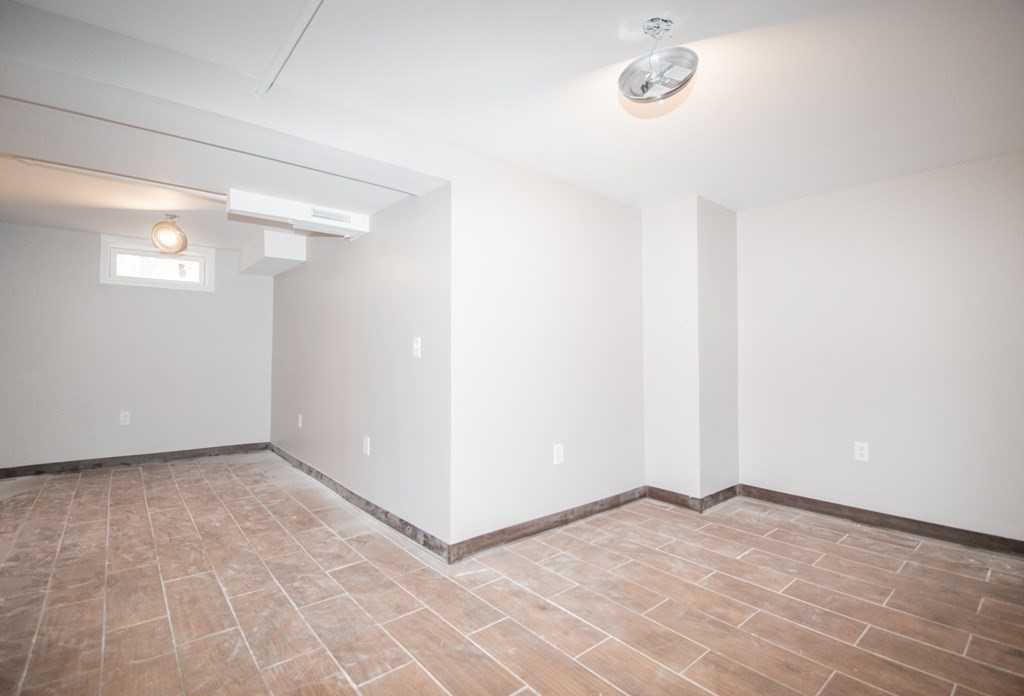 24 Lumae Street Springfield, MA 01119 - Photo 15 of 33 a view of an empty room with a chandelier fan