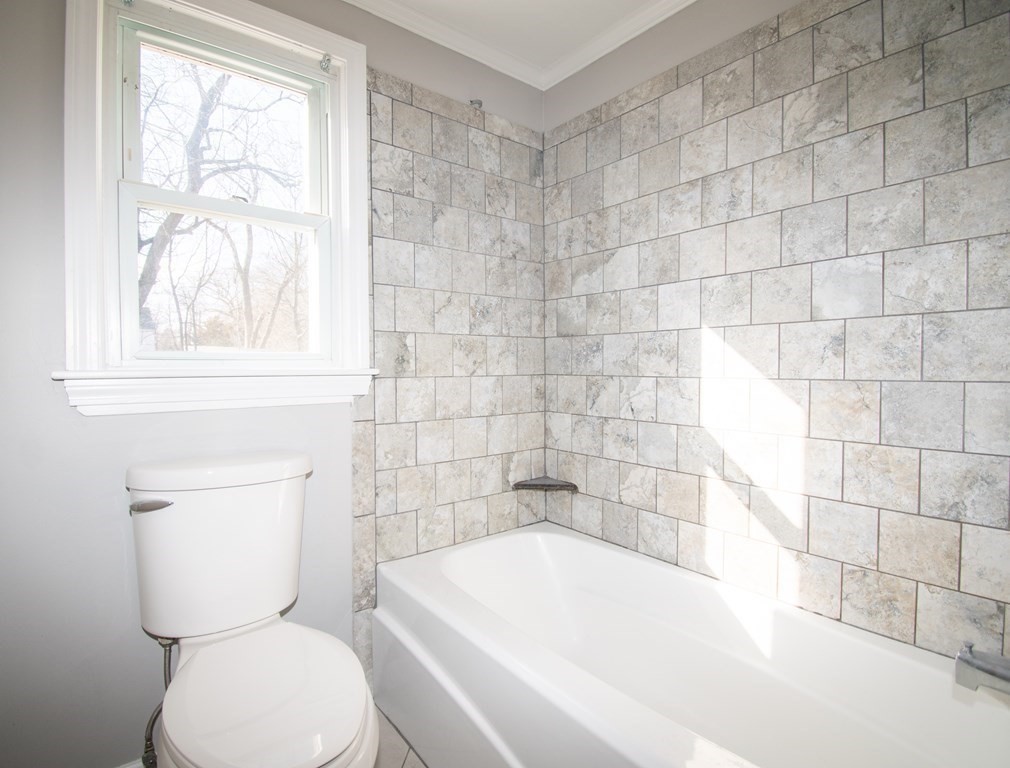 24 Lumae Street Springfield, MA 01119 - Photo 17 of 33 a bathroom with a toilet a sink and bathtub