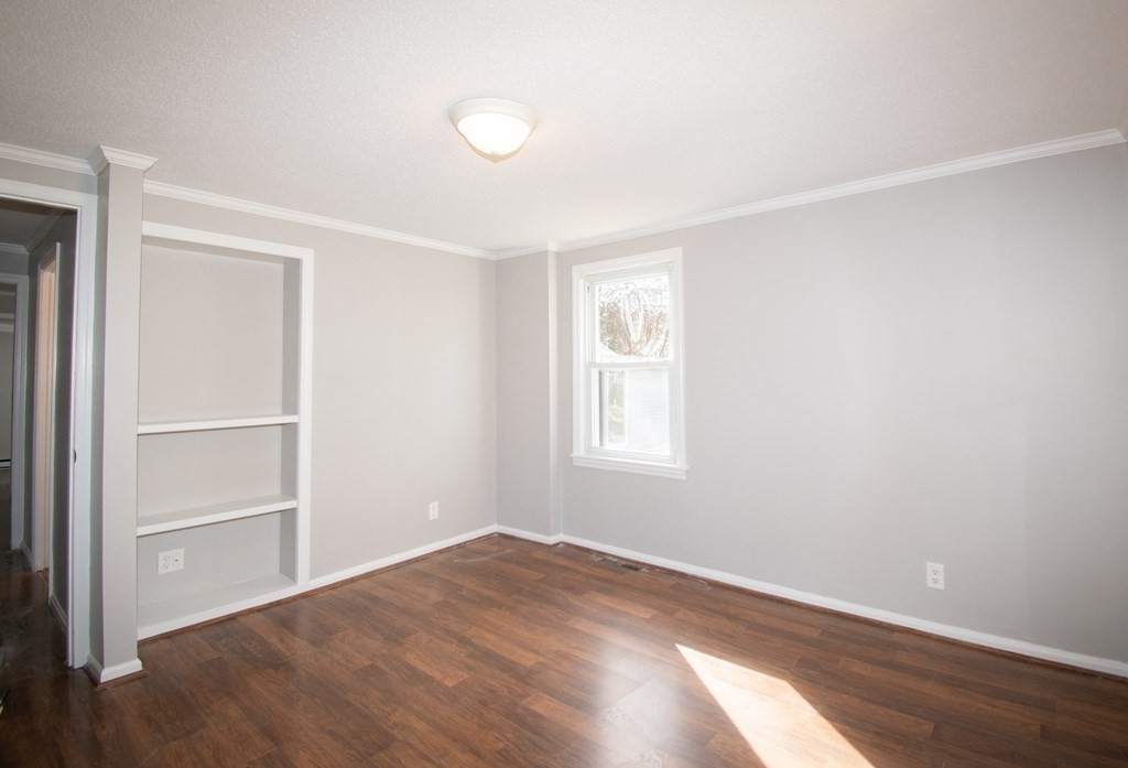 24 Lumae Street Springfield, MA 01119 - Photo 20 of 33 a view of empty room with wooden floor and fan
