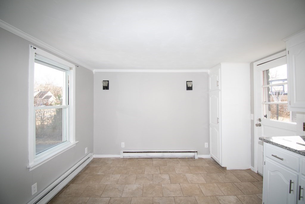 24 Lumae Street Springfield, MA 01119 - Photo 23 of 33 a view of an empty room with a window