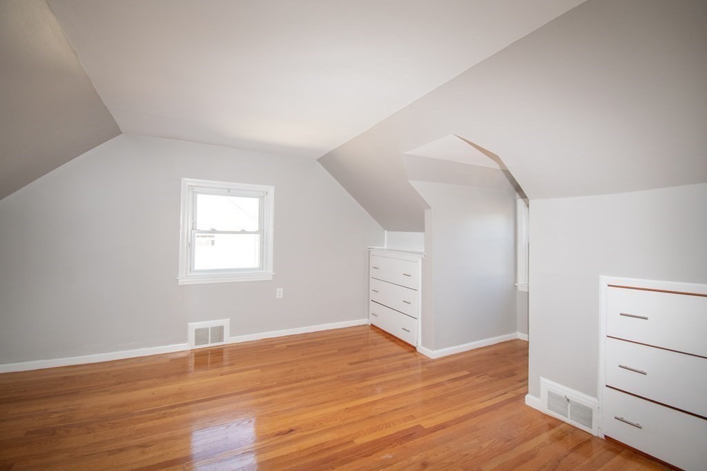 24 Lumae Street Springfield, MA 01119 - Photo 7 of 33 wooden floor in an empty room