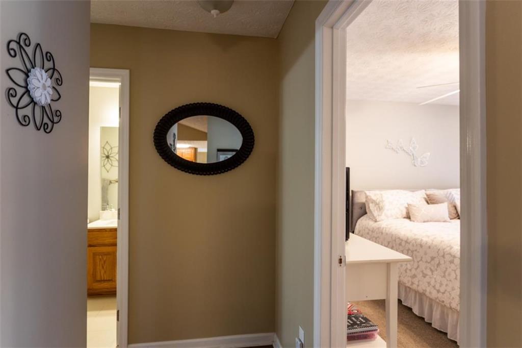 164 Laurel Lane Social Circle, GA 30025 - Photo 21 of 38 a bathroom with a sink and a mirror