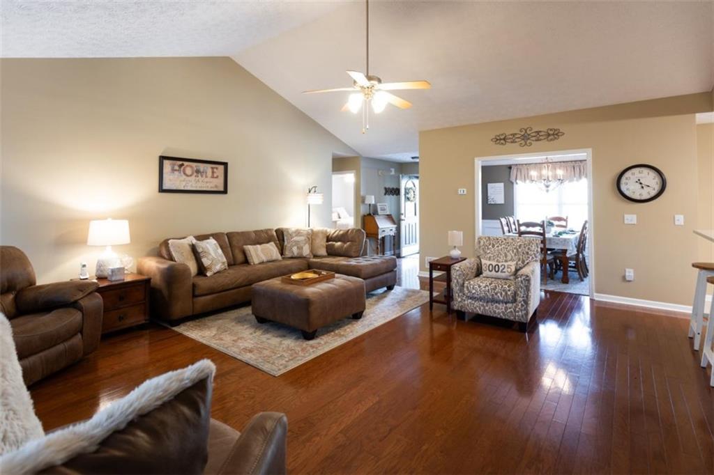164 Laurel Lane Social Circle, GA 30025 - Photo 5 of 38 a living room with furniture and a large window