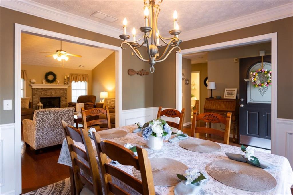164 Laurel Lane Social Circle, GA 30025 - Photo 10 of 38 a dining room with furniture and window