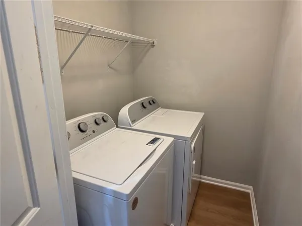 a utility room with dryer and washer