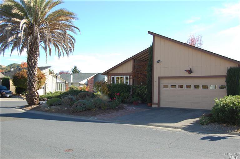 a view of a house with a street