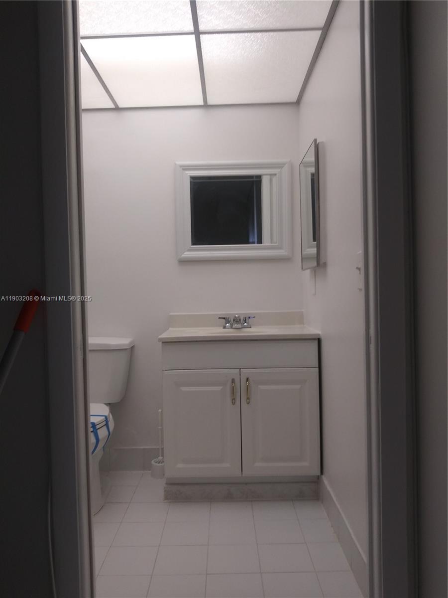 8650 Southwest 133rd Avenue Road, Unit 208 Miami, FL 33183 - Photo 10 of 10 a bathroom with a sink and a toilet